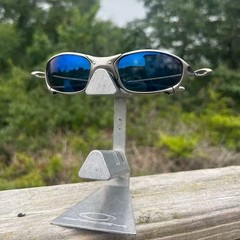 Retro style Oakley Juliet X-Metaletaletal polarized sunglasses with dark blue le