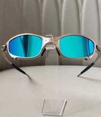 Oakley Juliet 1.0 X sunglasses, silver metal frame. Icy blue lenses