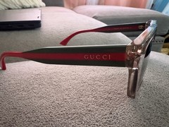 Gucci Men’s Rectangle Sunglasses Clear Frame Green Tinted Lens Red/Green
