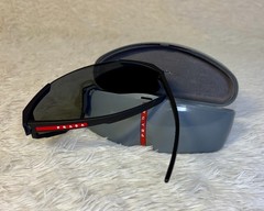 Large-size PRADA Eyewear sports sunglasses. 100% original