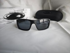 Oakley Fuel Cell Polarized OO9096-05 Black Frame Gray Lens