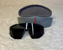 Large-size PRADA Eyewear sports sunglasses. 100% original