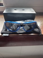 Oakley OO9467 CMDN Translucent Celeste Prizm Blue 133mm L Sunglasses