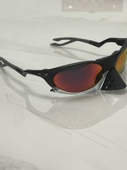 Oakley PLANTARIS Sunglasses OO9437-0363 Black/GrayColorwayGradient Orange Lenses
