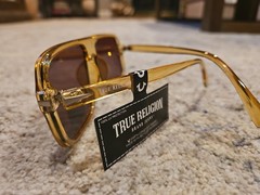 New True Religion Unisex Adults Sunglasses TRM1759X Golden Translucent
