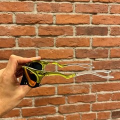 Oakley Plantaris Travis Scott OO9437 Sunglasses Clear Green Frame Ruby Lenses