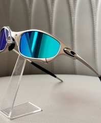 Oakley Juliet 1.0 X sunglasses, silver metal frame. Icy blue lenses