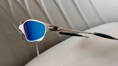 Oakley Juliet 1.0 X sunglasses, silver metal frame. Icy blue lenses