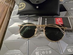 Ray-Ban Round Metal Sunglasses – Gold Frame with Green Lenses ORB3447