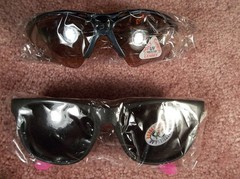 TWO PAIR ADULT UNITED STATES SECRET SERVICE NAME MARKED & USSS LOGOED SUNGLASSES