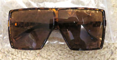 Lot of 6 pairs of Unisex Sunglasses, New in plastic bags or with tags, nice lot