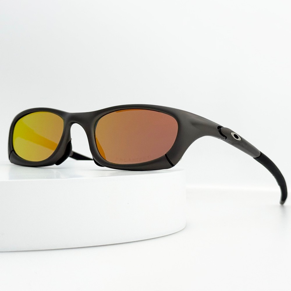 Oakley Mag Four Magnesium Four Sunglasses Gunmetal Frame Yellow Iridium Lens