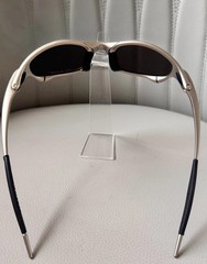 Oakley Juliet 1.0 X sunglasses, silver metal frame. Icy blue lenses