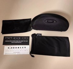 Oakley Juliet 1.0 X sunglasses, silver metal frame. Dark blue lenses