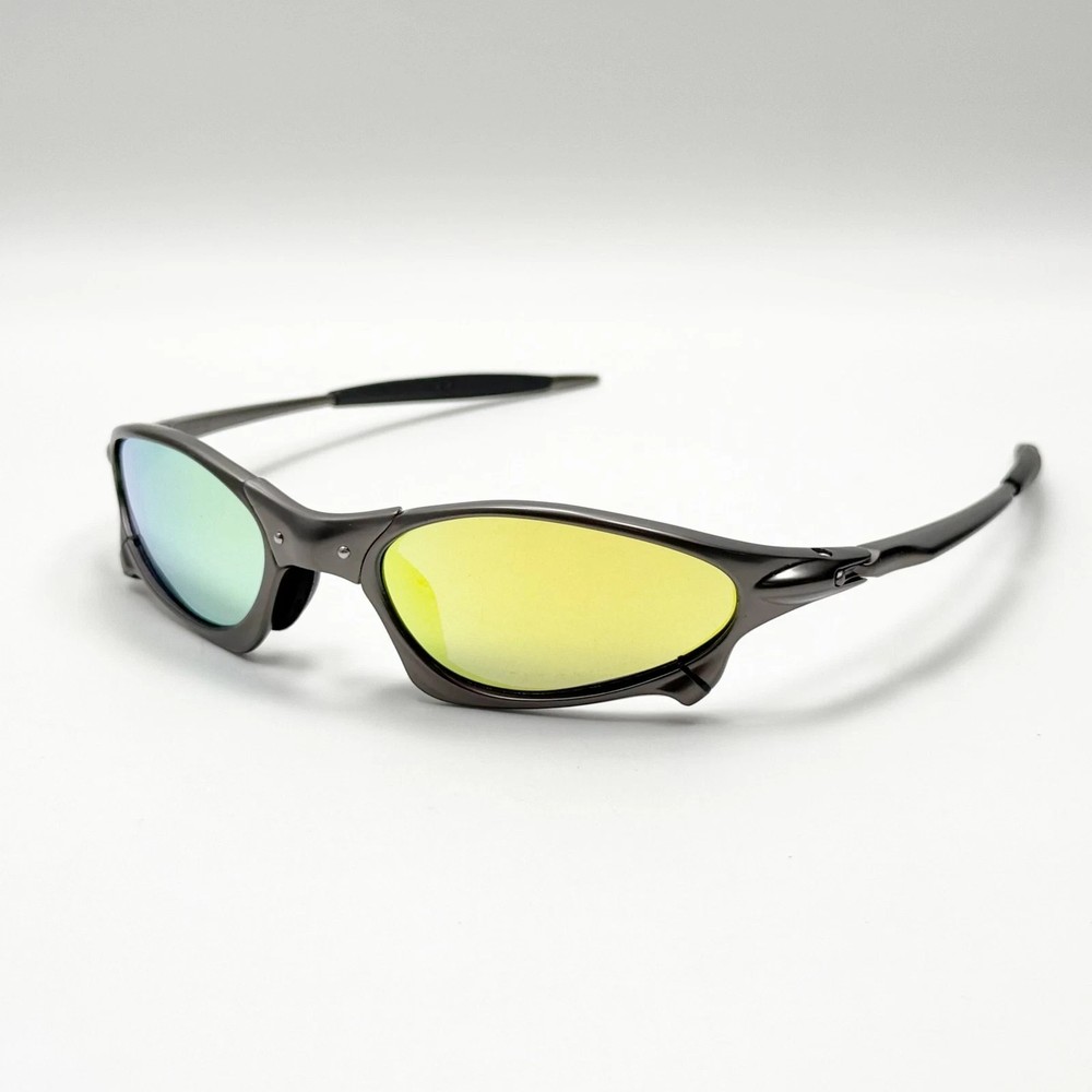 Oakley Penny X-Metal Sunglasses Gunmetal Frame Yellow Iridium Lens