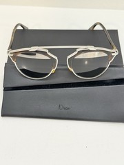 Dior women Round Sunglasses Silver Metal Frame Gray Tinted Plastic Lenses