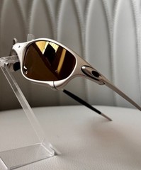Oakley Juliet 1.0 X sunglasses, silver metal frame. Brown-tinted lenses