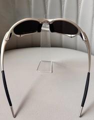 Oakley Juliet 1.0 X sunglasses, silver metal frame. Icy blue lenses