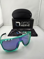 Optic Nerve Crystal Turquoise W/ Smoke Lens Purple Mirror NEW