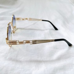 Round sunglasses, gold frame, blue and yellow gradient lenses, round