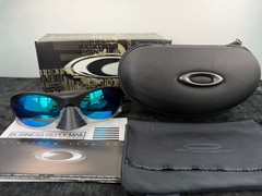 Oakley PLANTARIS Sunglasses OO9437-0136 Black Frame Polarized Blue Lens