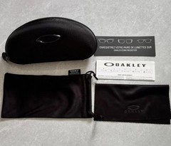 Oakley Romeo X-Metal sunglasses, silver frame. Golden lenses.