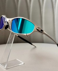 Oakley Juliet 1.0 X sunglasses, silver metal frame. Icy blue lenses