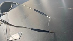 Oakley Romeo X-Metal sunglasses, silver frame. Green lenses.