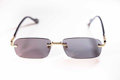 Gucci GG1221S 001 Gold-Black/Grey Rectangular Narrow Rimless Men’s Sunglasses