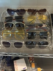Sunglasses With Display. Price $15-$79 New. Selling All For $140