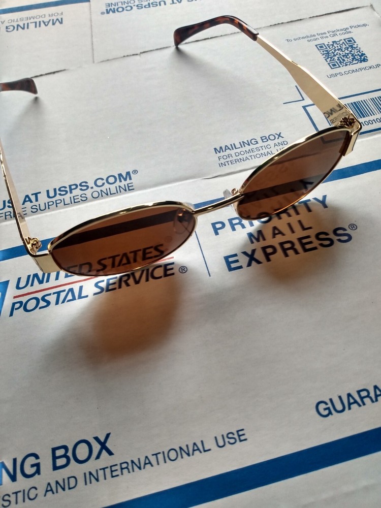 Yellow and Brown Sunglasses Unknown Brand Dark Lenses