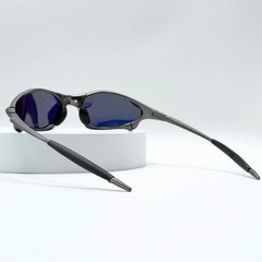Oakley Penny X-Metal Sunglasses Gunmetal Frame Yellow Iridium Lens