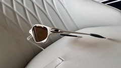 Oakley Juliet 1.0 X sunglasses, silver metal frame. Brown-tinted lenses