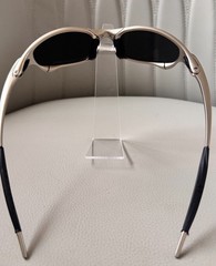 Oakley Juliet 1.0 X sunglasses, silver metal frame. Dark blue lenses