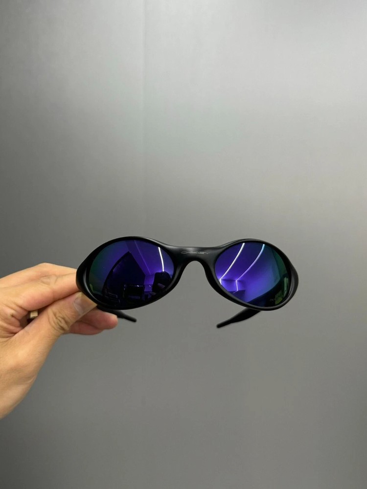 Oakley Romeo X-Metal sunglasses, with silver frame and brown lenses*