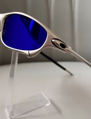 Oakley Juliet 1.0 X sunglasses, silver metal frame. Dark blue lenses