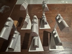 5 Oakley X Metal Stands + Penny Coin