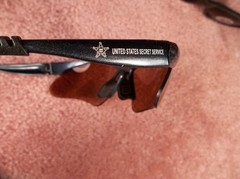 TWO PAIR ADULT UNITED STATES SECRET SERVICE NAME MARKED & USSS LOGOED SUNGLASSES