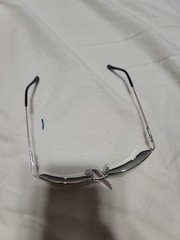 Sunglasses, made in China, has yellow/ amber color lens