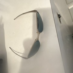 OakleyOval Metal Sunglasses Silver Frame Green Tinted Plastic Lenses