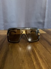 Gucci GG0900S Shield Sunglasses – Brown & Gold oversized fit