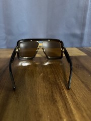 Gucci GG0900S Shield Sunglasses – Brown & Gold oversized fit