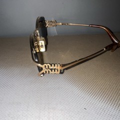 Miu Miu Oval Sunglasses Gold Metal Frame black Tinted, great condition , gifted
